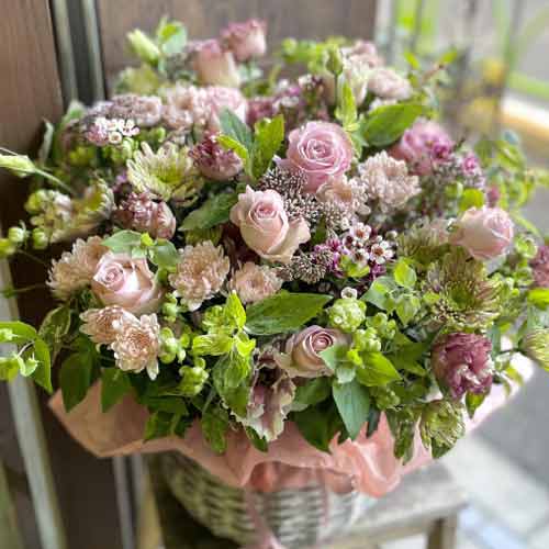 - - Giving Flowers Arrangement To Seniors